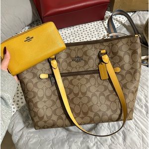Coach patterned yellow tote bag and wallet